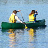 Two people in a canoe on a river