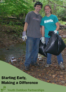 Youth Outdoor Partnership, two teens picking up trash
